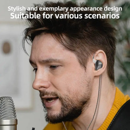 Black in-ear monitor with silver accents and sleek design for alta fidelidade fones and fones graves esporte ear hanging type