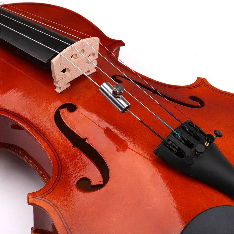 A glossy amber violin with polished wood and black fittings designed for cello eliminating wolf and musical instrument accessories