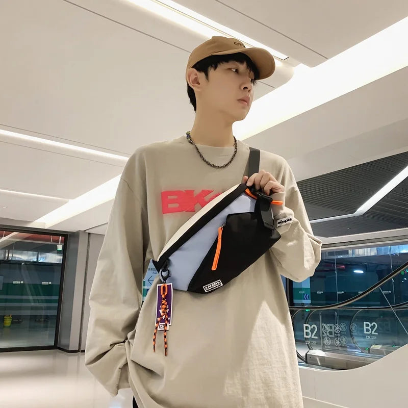 Black and light blue nylon chest rig bag women with orange zipper pulls purple tassel charm fanny pack streetwear