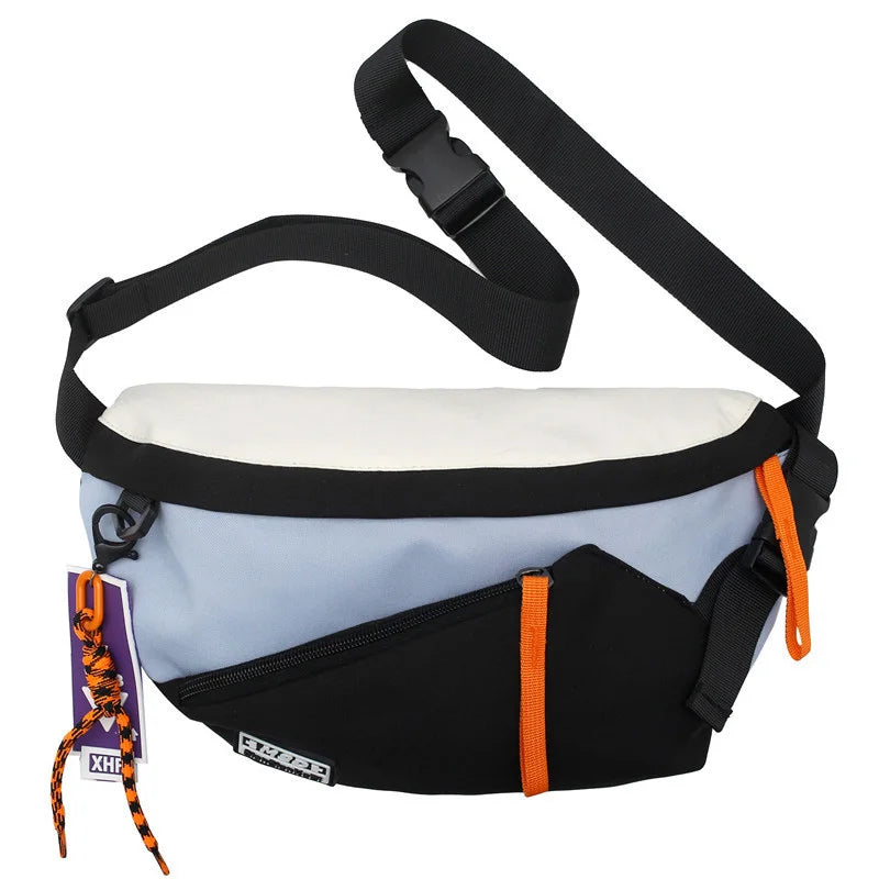 A sleek two-tone xhp chest rig bag women fanny pack streetwear with light blue nylon body and orange zipper accents
