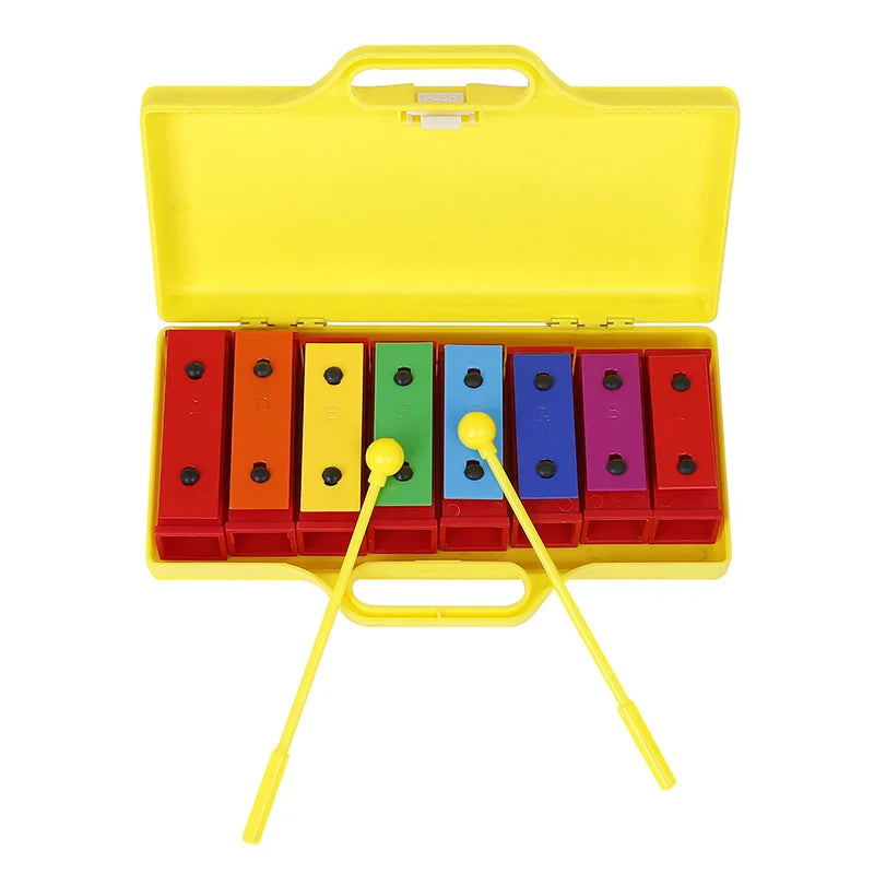 Bright yellow plastic case containing a colorful children xylophone montessori toy with rainbow bars and mallets for learning percussion music