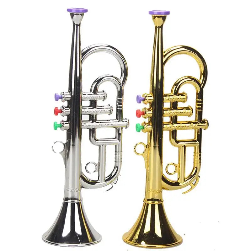 Two miniature toy trumpet musical instruments in silver and gold with colorful valve caps for simulated brass play house music equipment