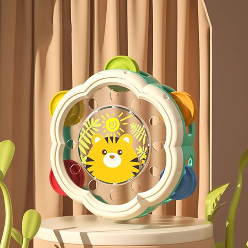 Colorful children’s early education puzzle tambourine with a yellow tiger face and multicolored jingles for fun hand clapping bell drum percussion