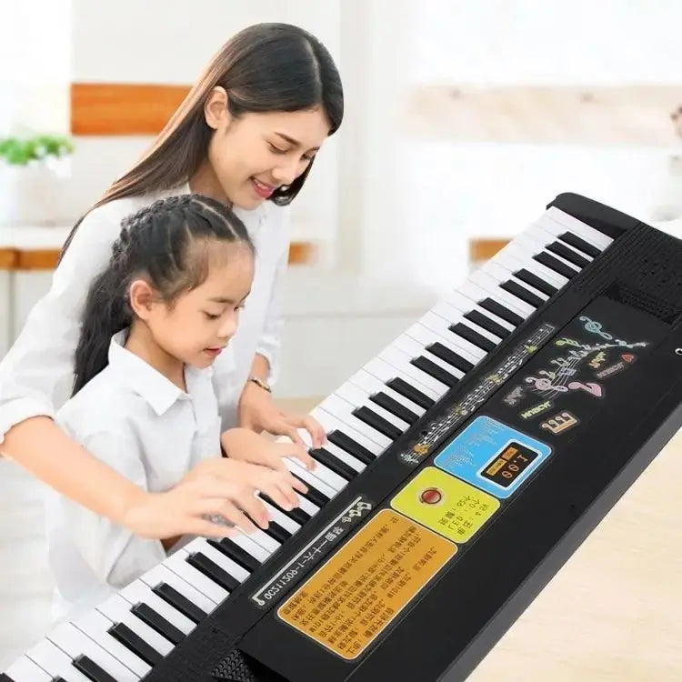 Black electronic keyboard piano with white keys colorful stickers digital display screen and microphone beginner musical toy