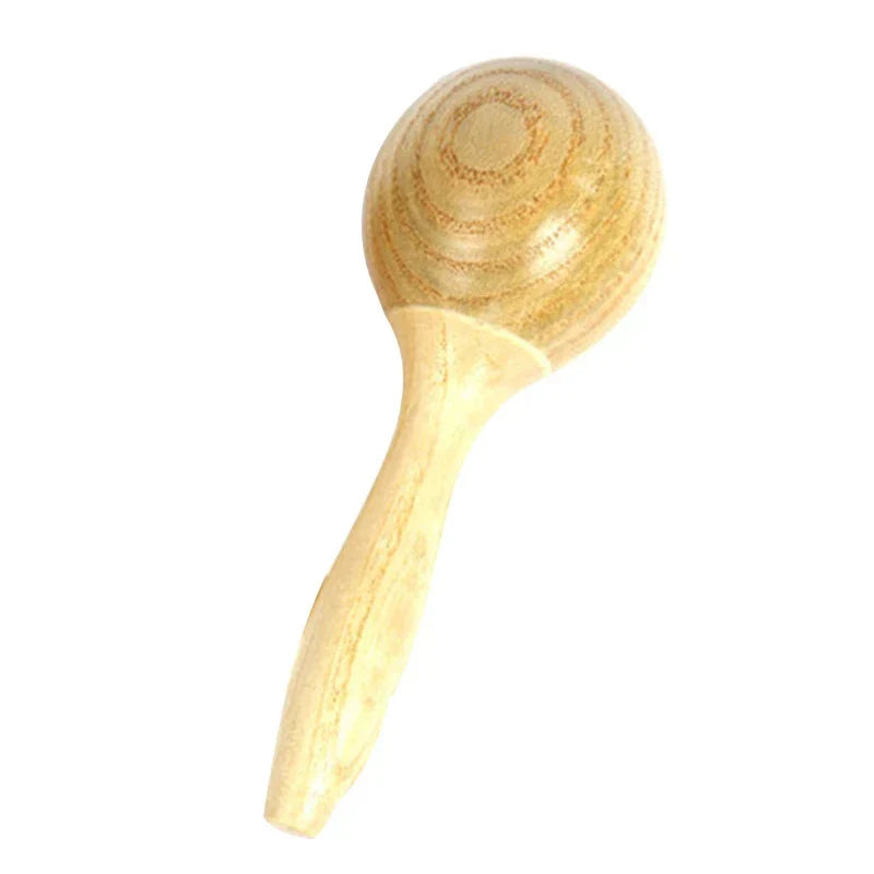 Light-colored wooden kids rain rattle with smooth rounded head and handle for shaker rainmaker music sensory play