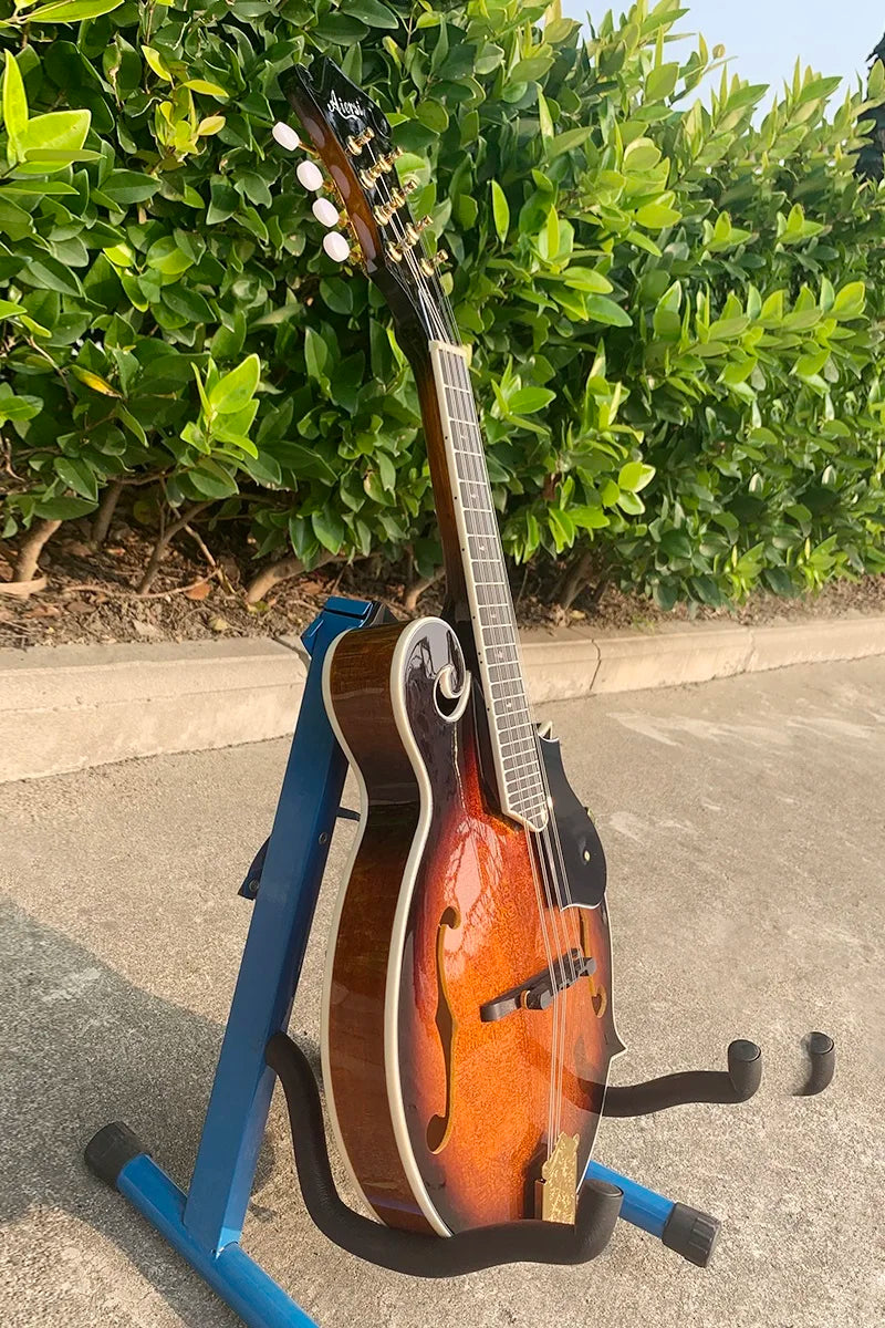 Aiersi brand mandolin handmade vintage sunburst bluegrass acoustic archtop with glossy wood and black pickguard on blue stand