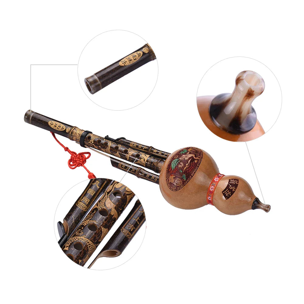 Black bamboo hulusi ethnic musical instrument with dark carved body and golden patterns in the key of c with case