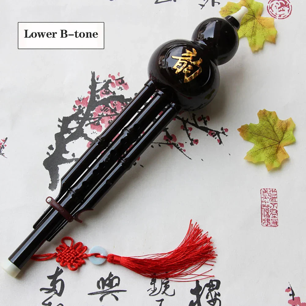 Black glossy ceramic chinese handmade hulusi double-horned flute with gold characters and red tassel for beginner music lovers