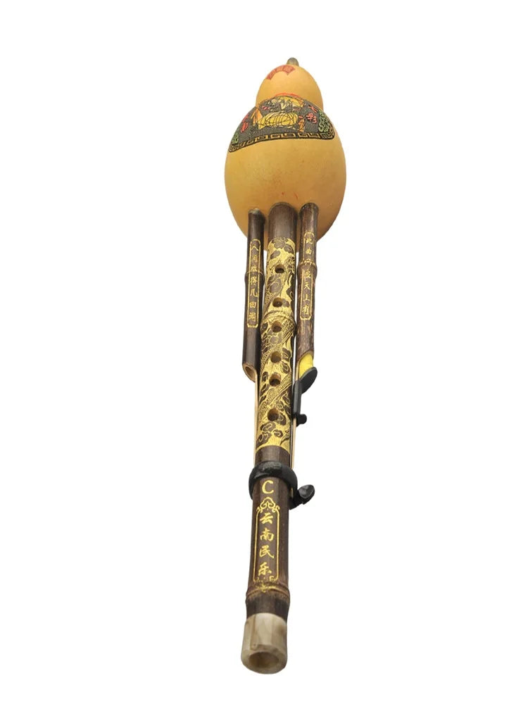 Chinese handmade hulusi bamboo flute with carved golden dragon and ornate gourd top in cucurbit c tune for beginner music lovers