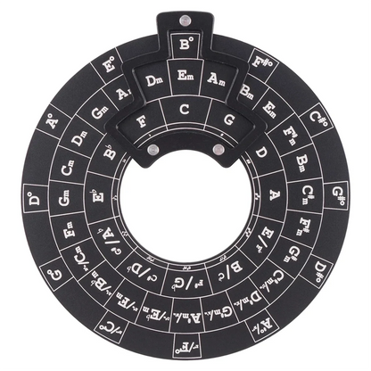 Black circular wooden guitar chord wheel displaying musical notes and chords for music theory and chord wheel use