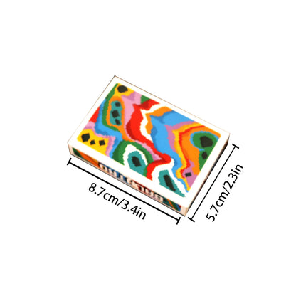 A classic balatro joker poker card set with a white edged box featuring vibrant swirling patterns for collectibles cards games