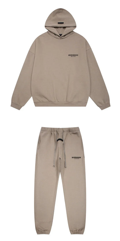Beige classic brand hoodies and joggers set with subtle black logo embroidery made from quality fleece sweatshirts for hiphop streetwear oversize look