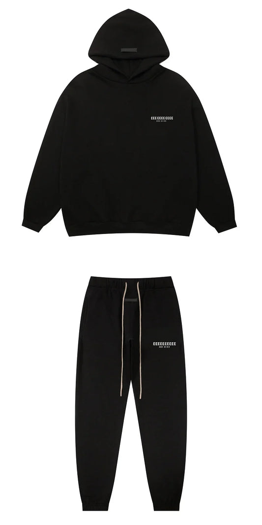 Black hoodie and joggers set with subtle white branding and matching drawstrings made from quality fleece sweatshirts for hiphop streetwear oversize look