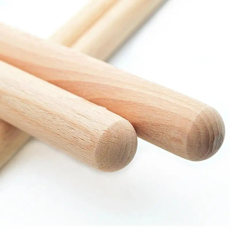 Natural wood classic claves rhythm sticks with smooth rounded ends and visible grain for percussion instrument kid use