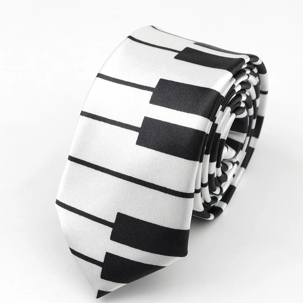 A sleek black and white satin skinny tie with piano key pattern perfect as a colorful musical notes printed width necktie party gift