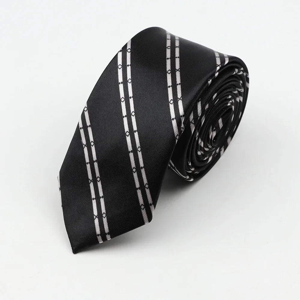 Black silk skinny tie with white geometric stripes suitable as a width necktie party accessory