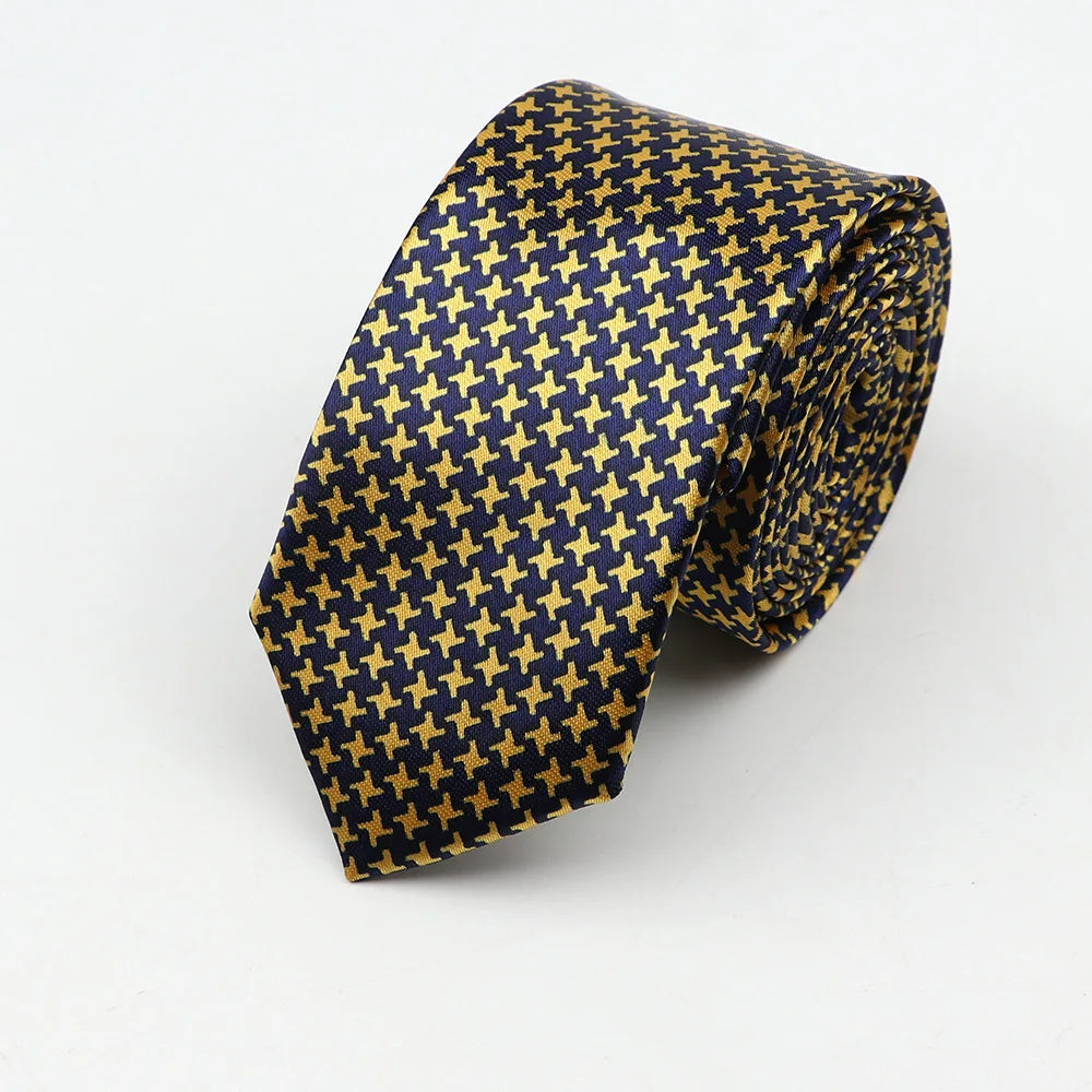 A navy blue and gold houndstooth patterned silk skinny tie colorful necktie party accessory in 5cm width