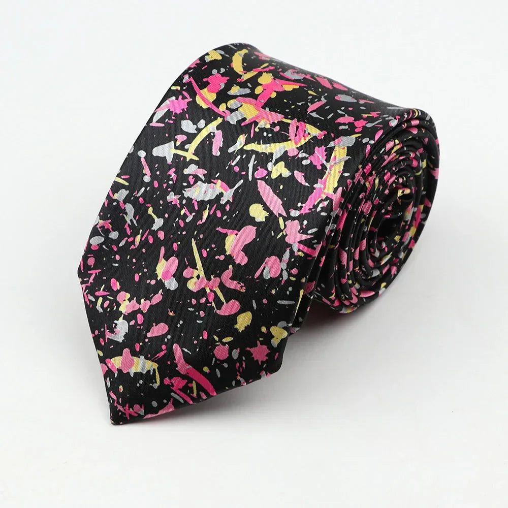 A black silk skinny tie colorful with vibrant pink yellow and white paint splatter pattern 5cm width necktie party accessory