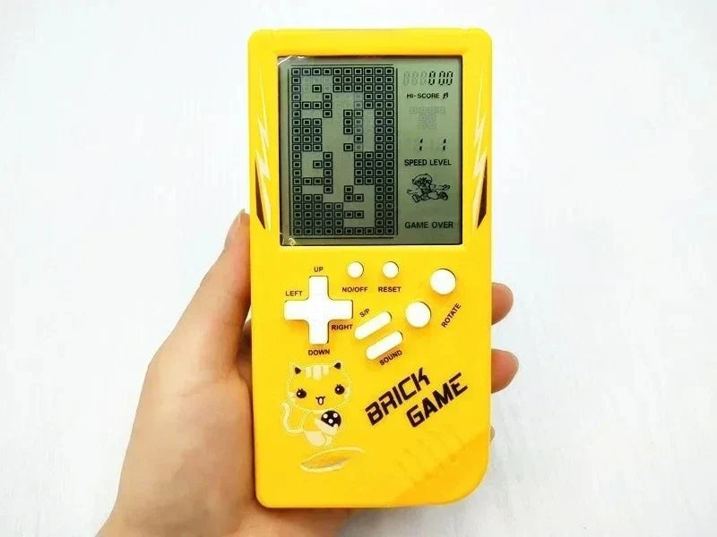 Yellow classic handheld game console with cute cat design white buttons and music playback retro feature for kids