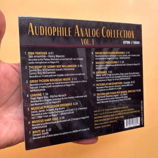 Black audiophile analog collection vinyl record album cover with gold lettering and track listing for henry mancini music classic improvisation album
