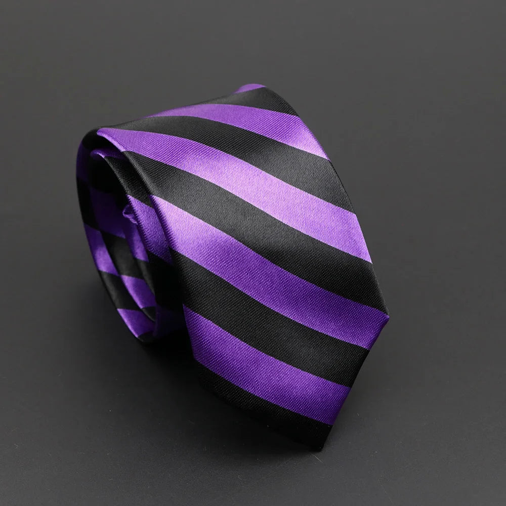 A sleek silky narrow necktie in purple and black stripes with a glossy finish perfect for classic musical notes style