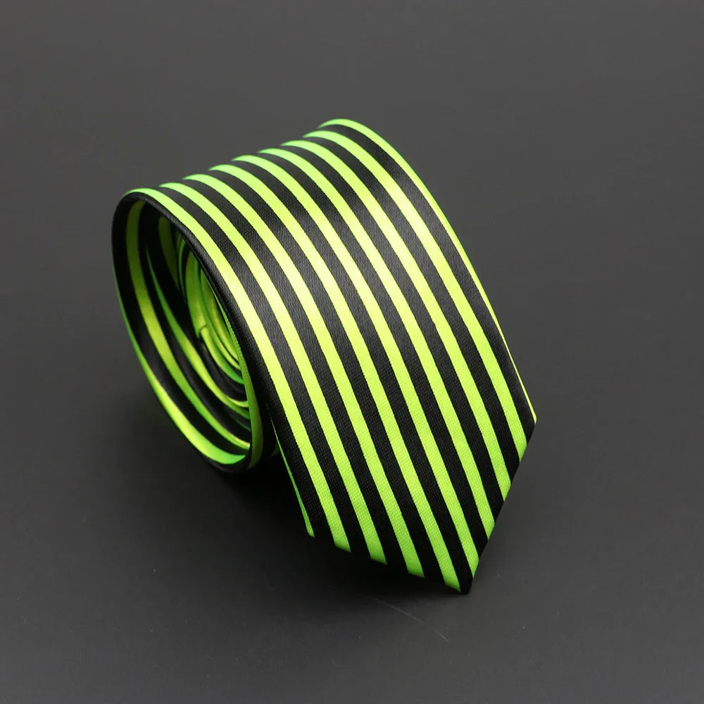 A sleek neon green and black striped silky narrow necktie coiled neatly for display, ideal as a classic musical notes accessory