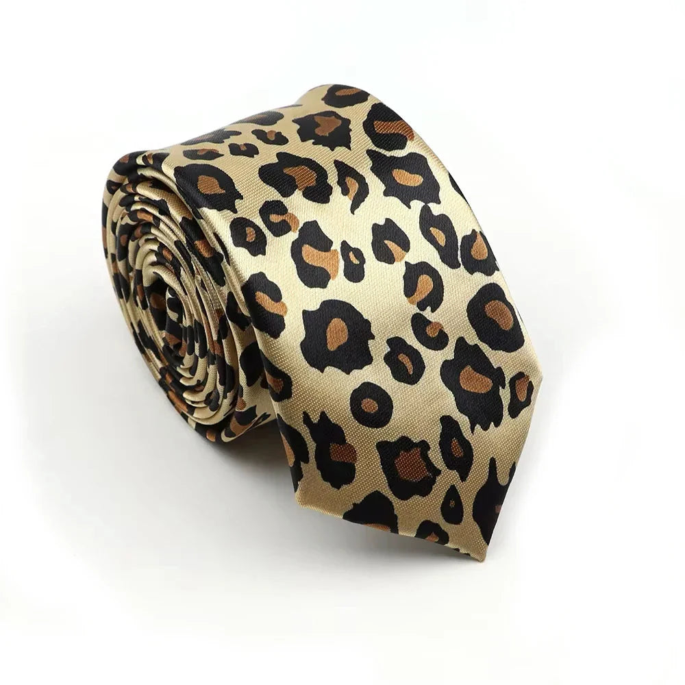 A beige silky narrow necktie with bold leopard print spots made from smooth satin, complementing classic musical notes styles