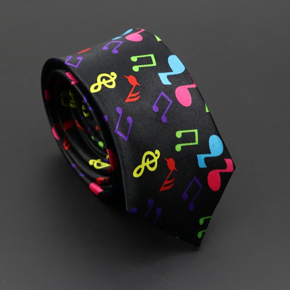 Black silky narrow necktie featuring classic musical notes printed in vibrant neon pink yellow blue green and red colors