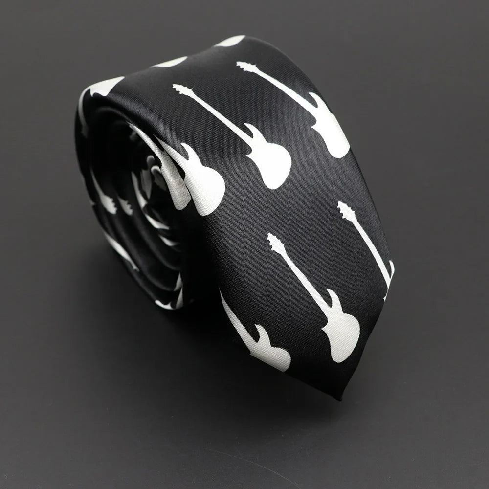 Black silk narrow necktie featuring classic musical notes printed with white electric guitar silhouettes in smooth fabric