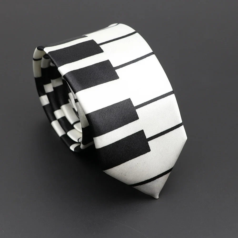 A sleek black and white silky narrow necktie featuring a classic musical notes piano key pattern for elegant wear