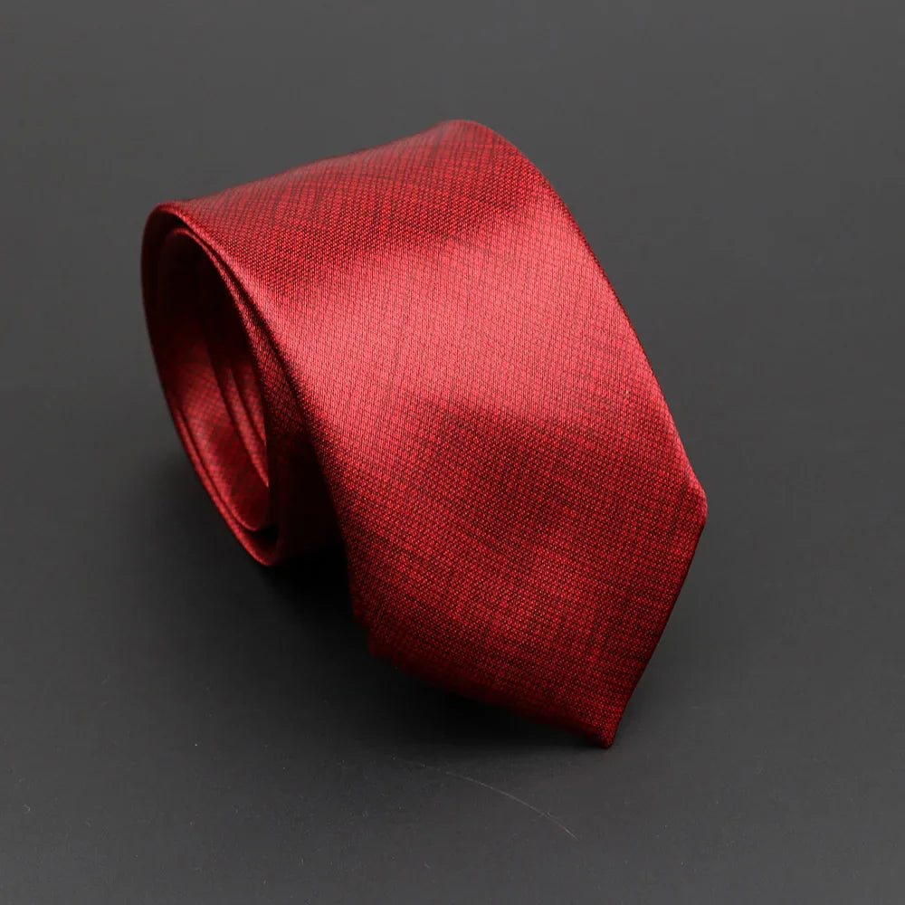 A classic musical notes silky narrow necktie in rich crimson silk with a subtle textured weave for elegant style
