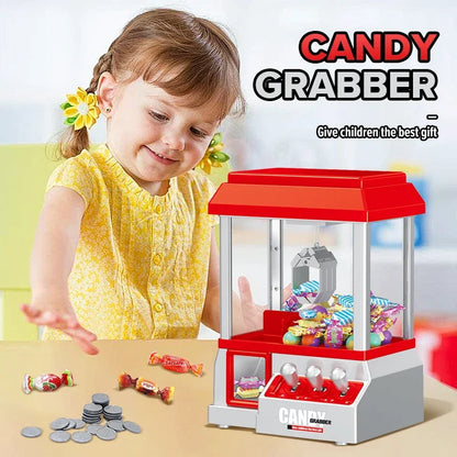 Red and silver claw machine electronic candy machine arcade with transparent front filled with colorful wrapped candies
