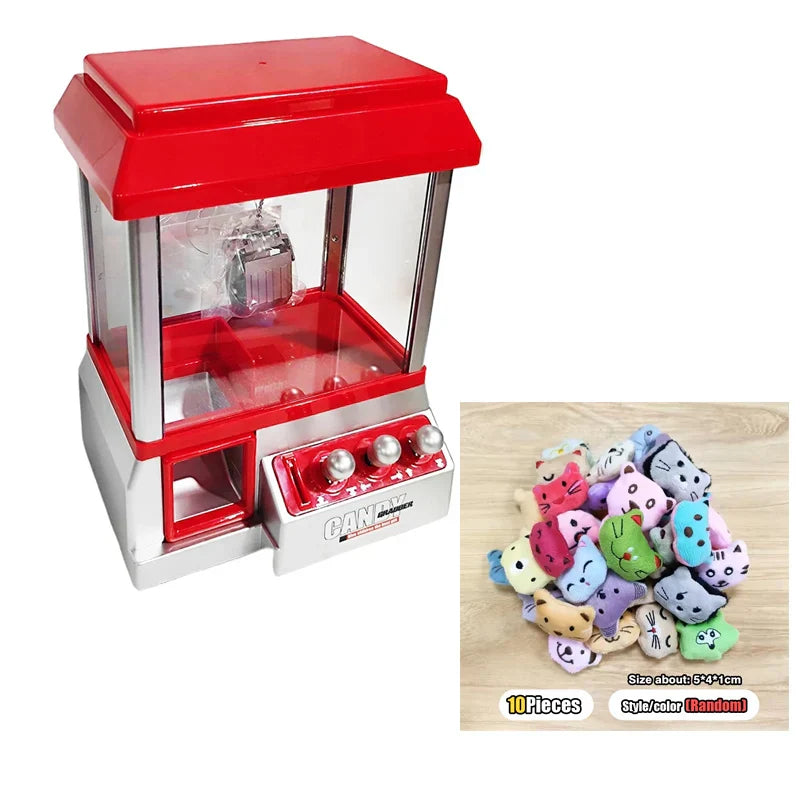 Red and silver claw machine electronic with clear glass front holding plush toys featuring retro carnival music for kids