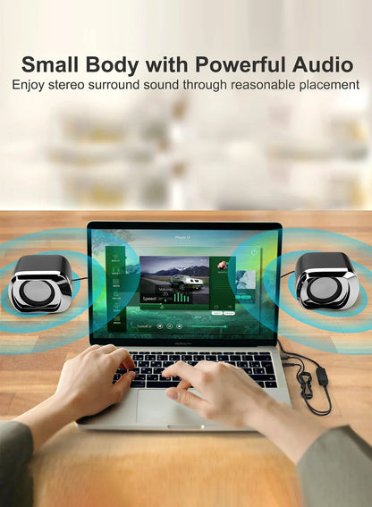 Black and silver usb-powered desktop speaker with compact design volume control and 3.5 mm audio plug for laptops