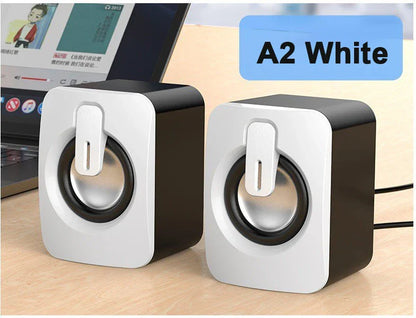 A2 white desktop speakers with silver drivers featuring aux home office connectivity for macbook desktop notebook use