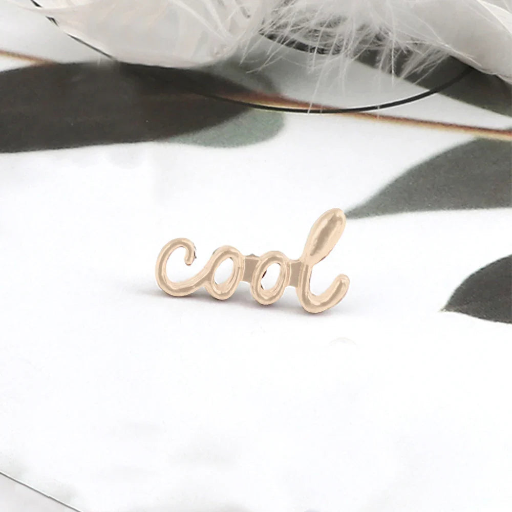 Gold-colored cursive cool word-shaped stud earring complementing music note enamel and piano notes lapel pins collection