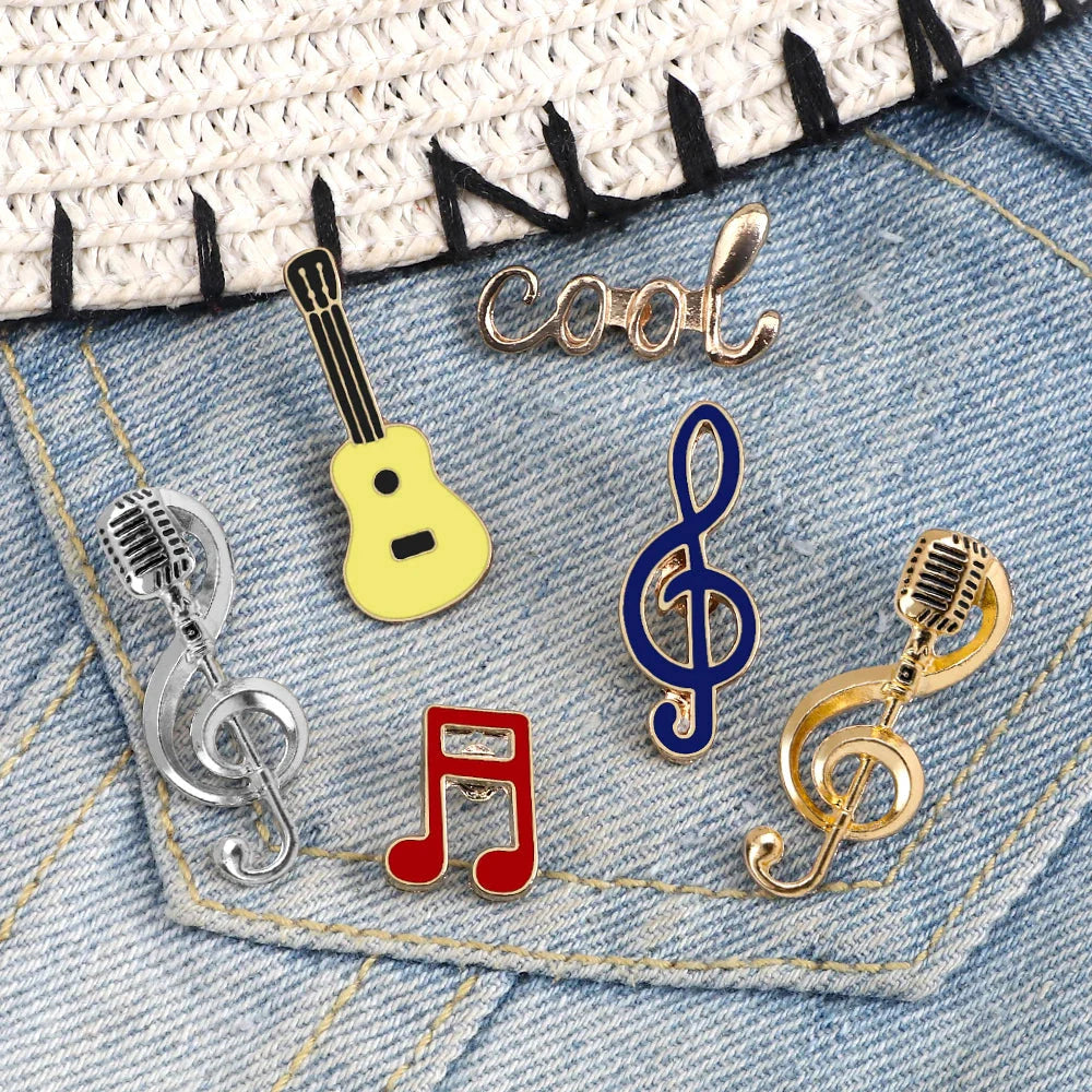 A set of colorful music note enamel pins featuring yellow guitar, red eighth notes, gold microphones, and piano notes lapel design