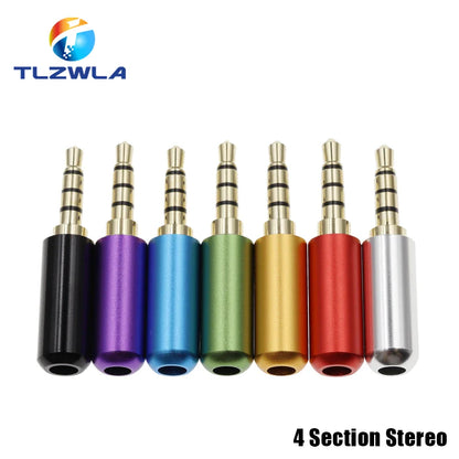 A set of seven colorful copper 3 4 pole 3 5mm male stereo audio adapters with gold plated tips and anodized aluminum bodies