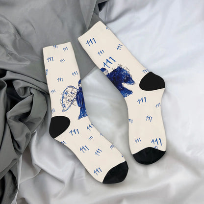 Cream-colored anti skid soft socks with blue bear and angel illustrations black toe caps for autumn leisure graphic use
