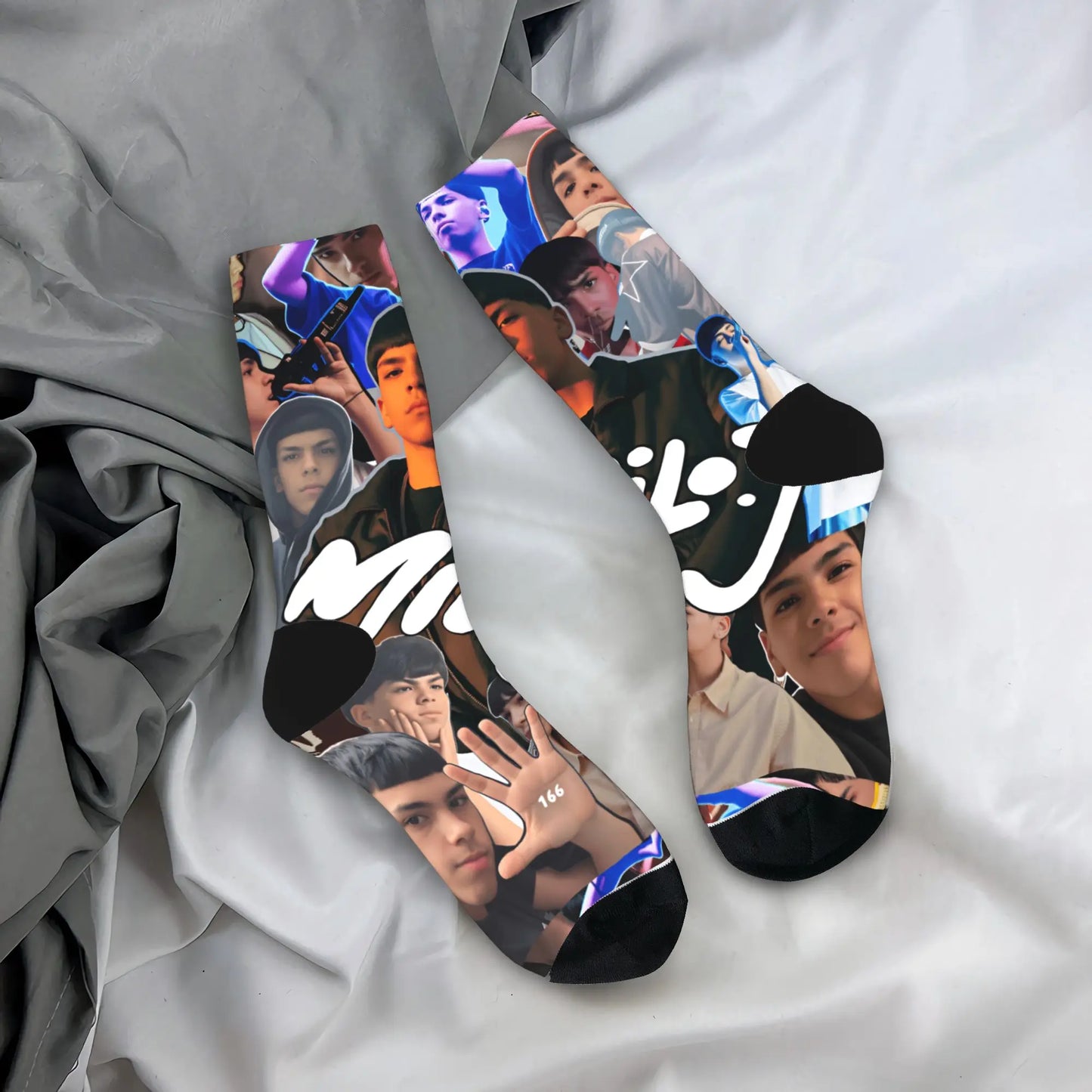 Black and multicolored couple socks featuring young men faces with bold white lettering anti skid soft autumn leisure graphic