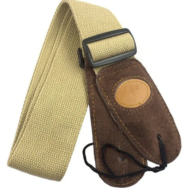 Tan canvas cotton guitar strap with brown cowhide head suede end piece and black buckle for folk guitar acoustic use