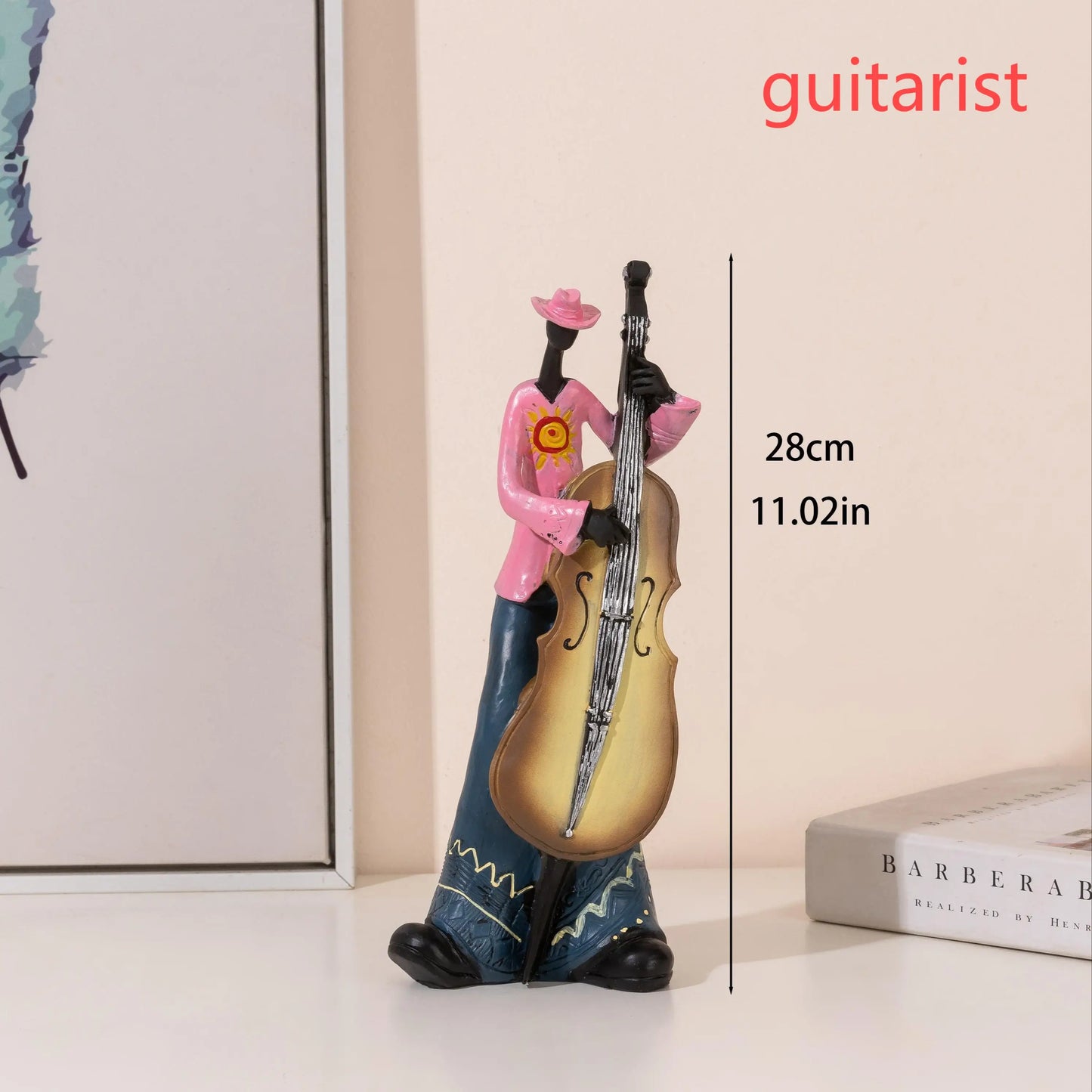 Pink and blue resin creative american band musical instrument model of a guitarist holding an upright bass for study nordic arts