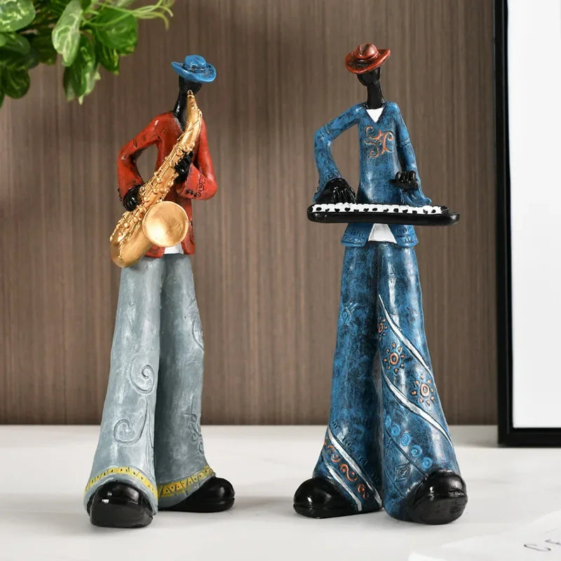 Two stylized creative american band crafts statue sculpture with red and blue outfits for porch study nordic decor