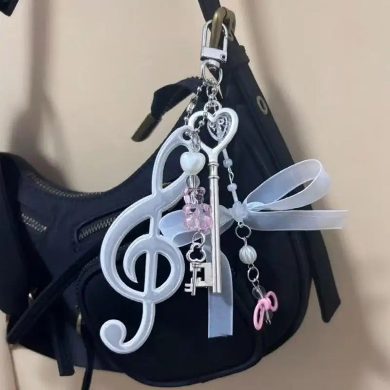 Delicate white plastic note keychain bowknot with silver key pink beads for handbag backpack pendant theater gifts