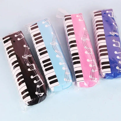 Four colorful piano stationery pouch pencil cases in brown light blue pink and purple square single layer oxford cloth