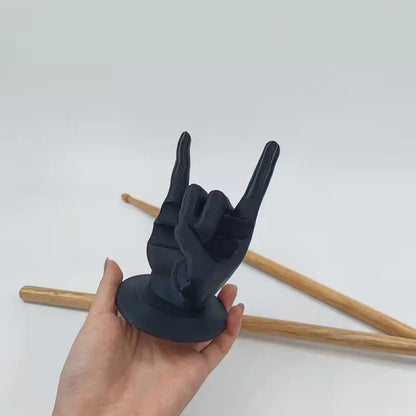 Black resin creative rock hand drumstick display stand with flat circular base for home decoration and drummer gift