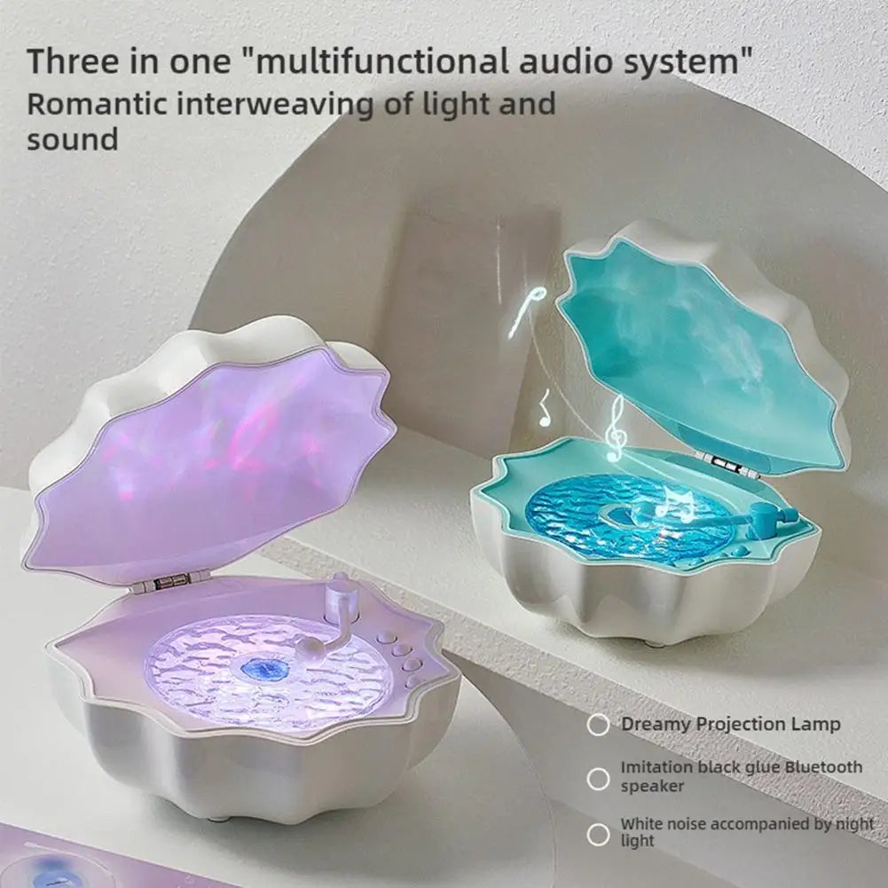 Purple and teal seashell-shaped shell light wireless bluetooth speakers with glowing interiors for desktop ornaments romantic gifts