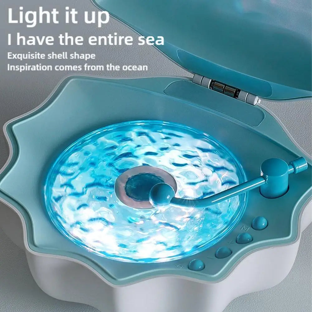 Teal shell light wireless speaker with glowing blue ripple effect and subwoofer sleeping desktop ornaments romantic gift