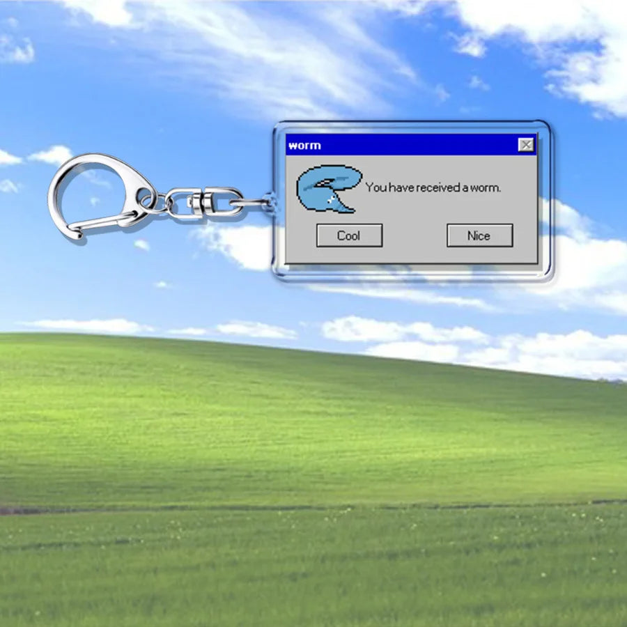 A clear acrylic creative xp window keychain with retro blue gray worm error design for failed successfully keychain fans