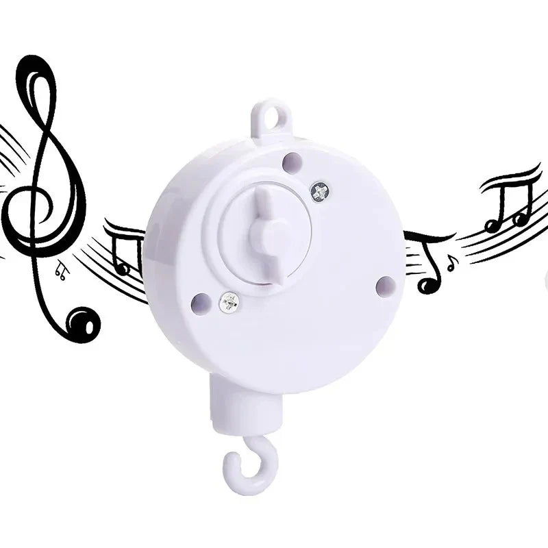 White plastic crib bell rotary music box with hook and musical notes for 0 to 12 months enhancing hand-eye coordination